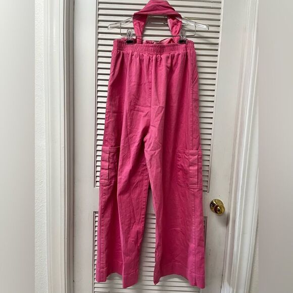 Fashion Nova Pants - FASHION NOVA XL
cargo pants BACKLESS jumpsuit
Pink wide leg
Elastic waist
15 w
